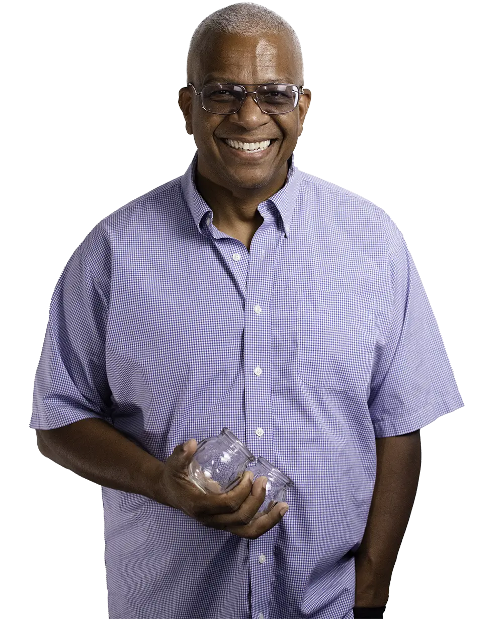 Victor Manuel, acupuncturist, holding cups for cupping technique